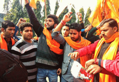Bajrang Ddal activists burn greeting cards and shout slogan during protest against Valentine's Day celebrations in Jammu. 